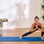 Master the Lateral Lunge: Your Key to Powerful Glutes, Quads, and Inner Thighs 2 A person demonstrating the lateral lunge exercise, stepping to the side with one leg bent and the other straight.