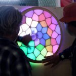 Robert Quattlebaum's Lumanoi interactive LED sculpture, featuring flowing light patterns.