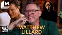 Matthew Lillard smiling during an interview, hinting at his return to the Scream franchise.