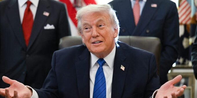 Donald Trump speaking, with logos of Netflix, Paramount, and Warner Bros. Discovery subtly in the background, representing the media industry battle.