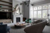 A stunning blend of heritage and modern design in a renovated 1912 Federation home in Melbourne, featuring bold art and vibrant colours.