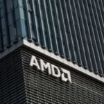 Meta CEO Mark Zuckerberg and AMD CEO Lisa Su shaking hands, symbolizing their new AI chip partnership.