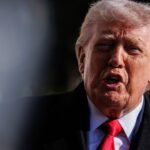 Former President Donald Trump speaks to reporters on the South Lawn of the White House before boarding Marine One.