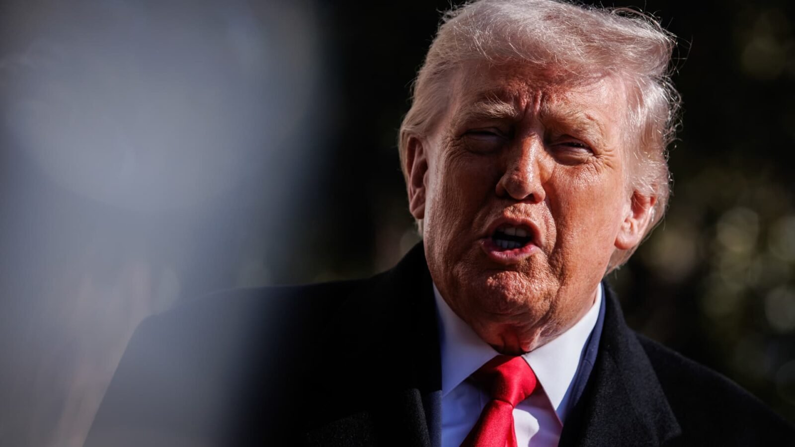 Former President Donald Trump speaks to reporters on the South Lawn of the White House before boarding Marine One.