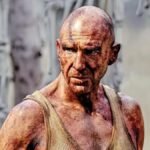 A collage of iconic horror movie scenes and Netflix logo, representing top horror films available for streaming.