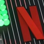 Netflix's Strategic 'No': Why Walking Away From Warner Bros. Sent Shares Soaring 4 Netflix logo against a backdrop of financial charts, symbolizing its strategic withdrawal from the Warner Bros. Discovery bidding war.