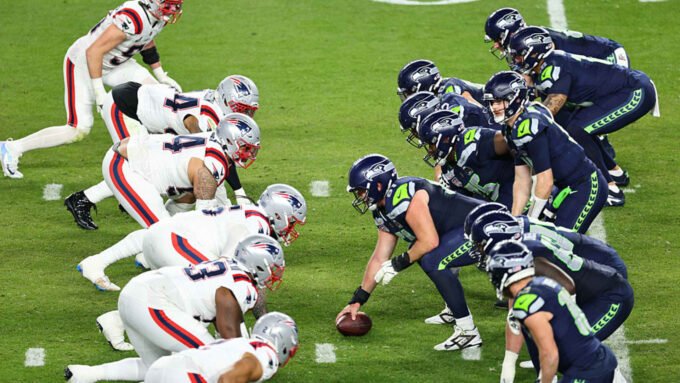 NFL players in action during an international game, symbolizing the league's global expansion and reach.