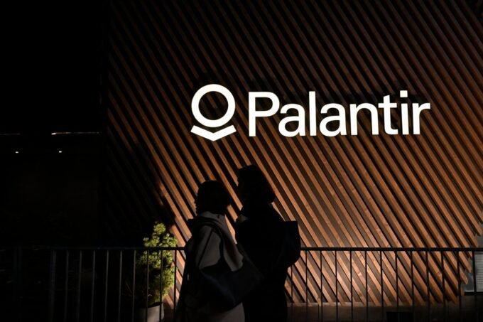 Palantir Technologies logo displayed on a screen, symbolizing its strong Q4 earnings and AI-driven business growth.