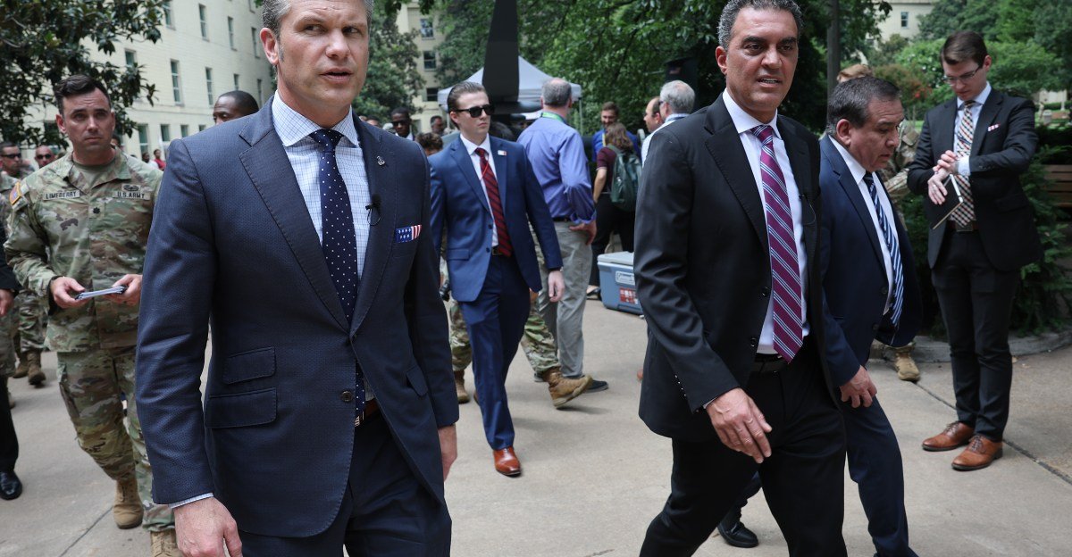 Pentagon's AI Frontier: Unpacking the Controversial Team Shaping America's Defense Tech 3 U.S. Secretary of Defense Pete Hegseth (L) and Under Secretary of Defense Emil Michael (R) tour an exhibit of Multi-Domain Autonomous systems at the Pentagon.