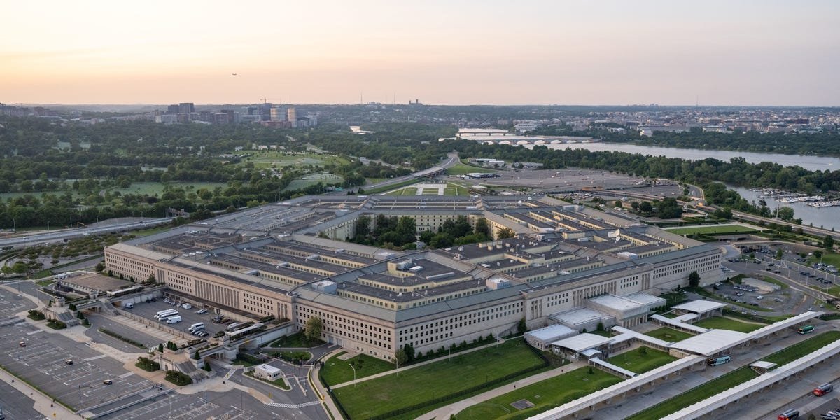 Pentagon's 'High-Risk' University List Leaked: What It Means for Academia and National Security 3 Illustration of a university campus with a subtle overlay of a Pentagon logo, symbolizing the intersection of academia and national security concerns.