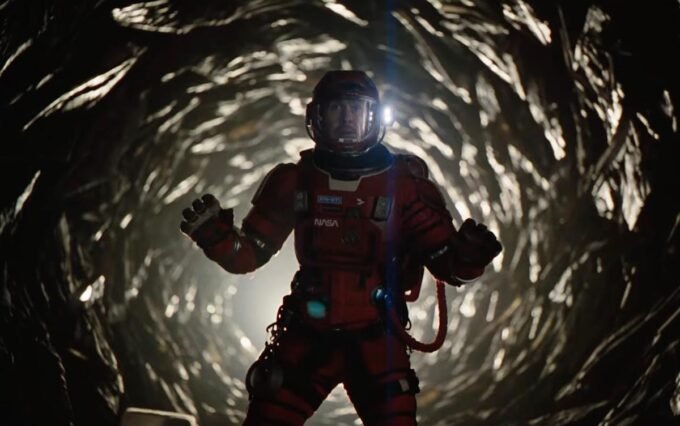 Ryan Gosling as Dr. Ryland Grace with his five-legged alien co-star Rocky in Project Hail Mary