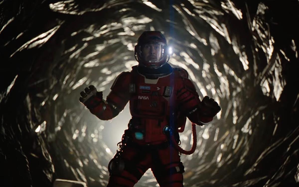 Ryan Gosling as Dr. Ryland Grace with his five-legged alien co-star Rocky in Project Hail Mary