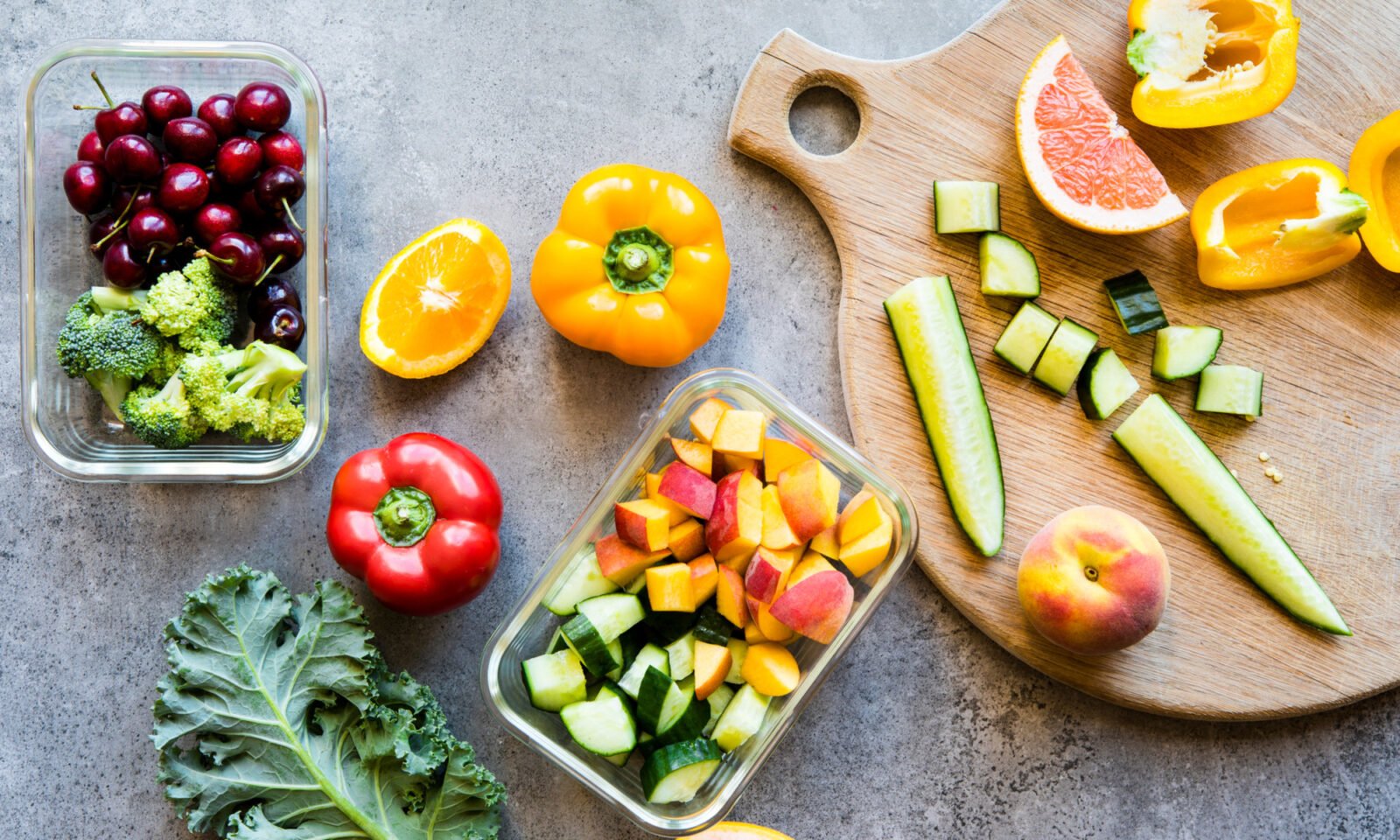 A vibrant bowl of fruits and vegetables rich in quercetin, such as berries, onions, and capers, symbolizing healthy aging and vitality.