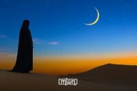 Muslims breaking fast during Ramadan in a Spanish city, with a mosque in the background