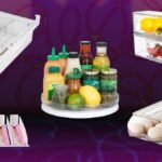 A perfectly organized refrigerator interior with various clear storage bins, neatly arranged produce, condiments, and beverages.