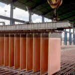 Vue aérienne d'une exploitation minière en République Démocratique du Congo, illustrant l'activité intense du secteur minier africain convoité par les traders pétroliers.