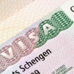 Schengen's New Horizon: EU Proposes Extended Multiple-Entry Visas for Trusted Travelers 4 A digital representation of the Schengen area map with a visa stamp icon, symbolizing extended travel opportunities.