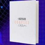 A collection of romantic and intimate gifts, including a date night book and lingerie.