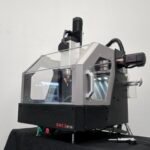 The Shariff DMC2 Mini: A Desktop CNC Powerhouse for the Dedicated Maker 6 Shariff DMC2 Mini CNC Mill in action, cutting a metal workpiece.