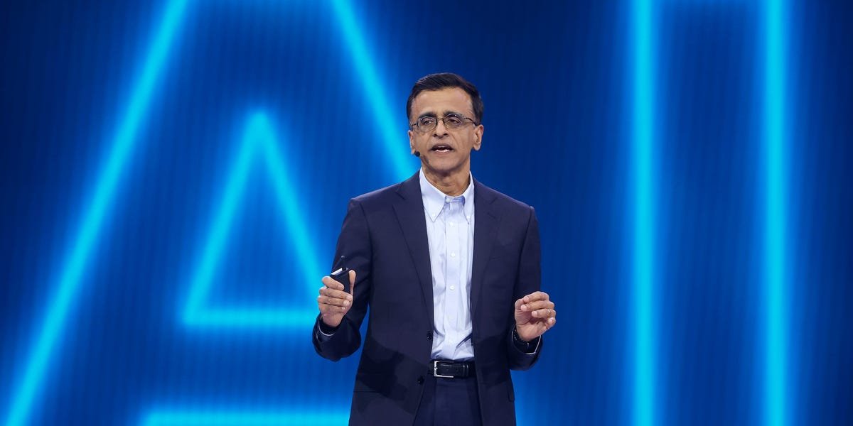 Snowflake CEO Frank Slootman speaking at a tech conference, with a graphic representing data flowing into AI models in the background.