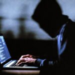 Illustration of a broken software supply chain with malicious code infiltrating development environments.