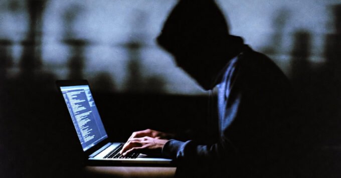 Illustration of a broken software supply chain with malicious code infiltrating development environments.