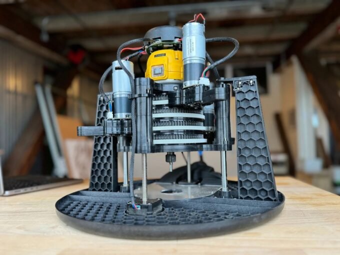 An illustrative image of a compact CNC machine in a small workshop, demonstrating its space-saving design.