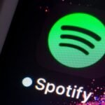Spotify 'About the Song' feature interface showing song facts and artist information
