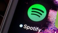 Spotify 'About the Song' feature interface showing song facts and artist information