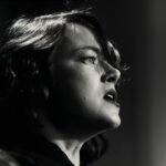 A collection of dynamic and engaging Super Bowl LX advertisements playing on multiple screens, symbolizing creativity and impact.