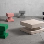 TAITŌ Poufs by +kouple showcasing their unique sharp yet soft design and versatile use in a modern interior.