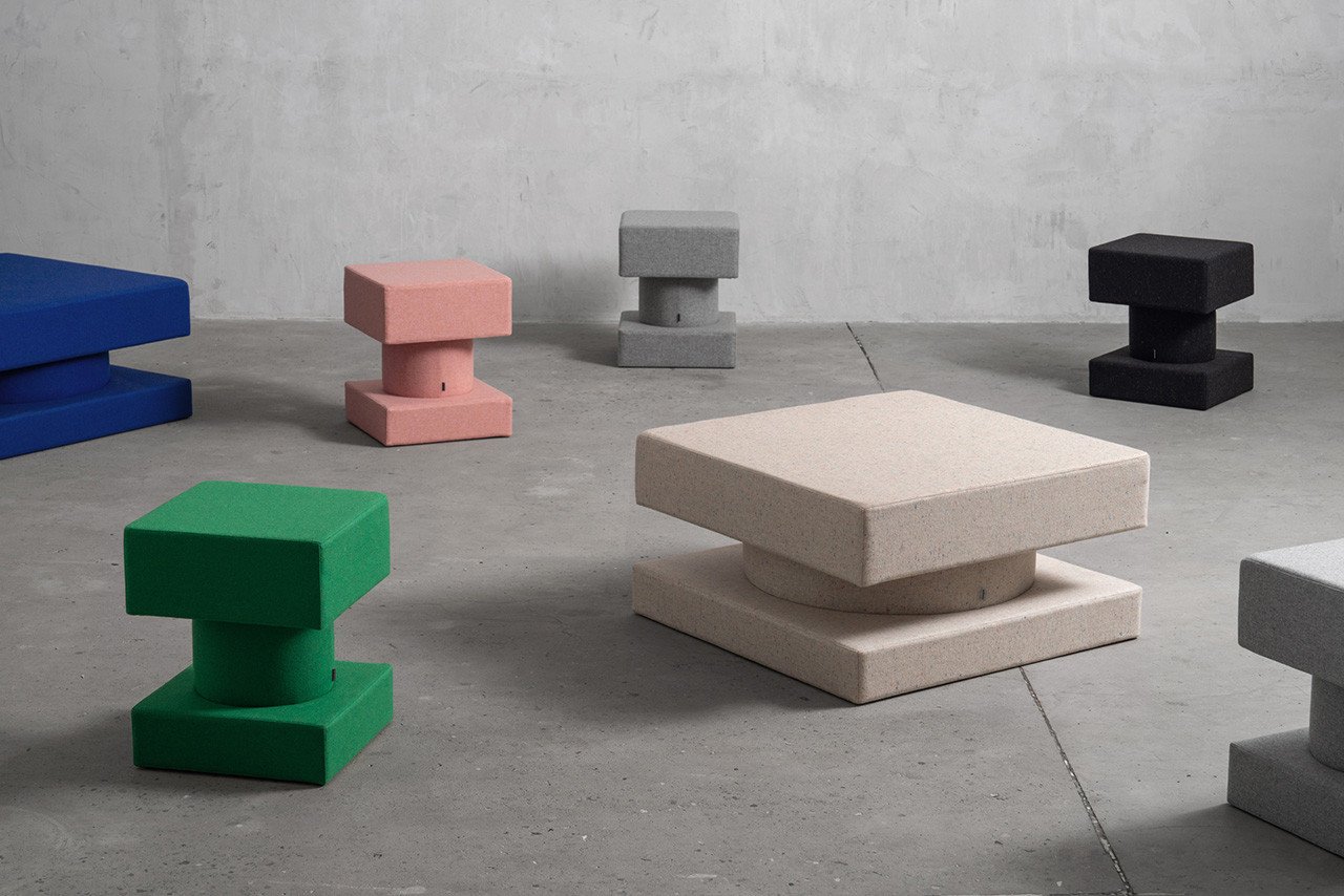 TAITŌ Poufs by +kouple showcasing their unique sharp yet soft design and versatile use in a modern interior.