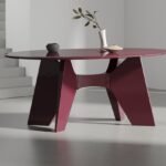 Tottolo table showcasing its uniquely carved legs and top, embodying playful, intuitive design.