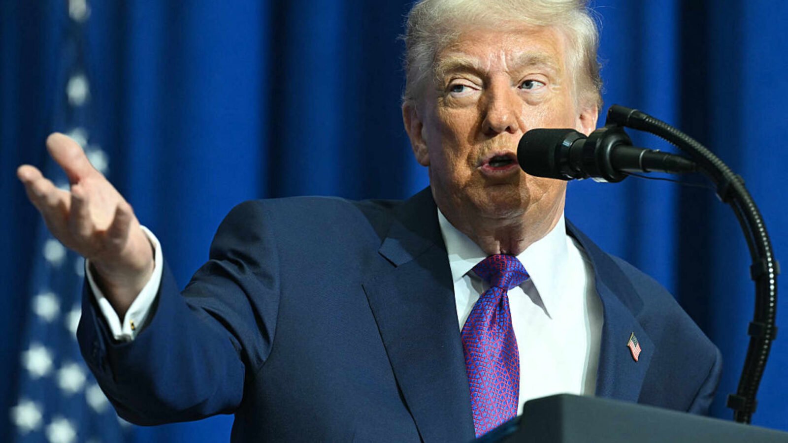 President Donald Trump making an announcement, with a backdrop suggesting Middle East tensions and rising oil prices.