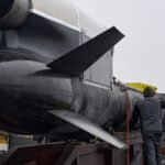 Ukraine's 'Flamingo' Missile: A 900-Mile Strike on Russia's Iskander Factory Signals New Era 4 An illustration of a Ukrainian-designed long-range missile, possibly the 'Flamingo', striking a factory building in a distant Russian region.