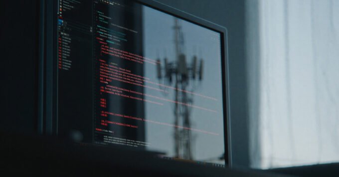 Digital representation of a network under attack, illustrating cyber espionage targeting Singapore's telecommunications infrastructure.