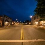 A scenic overview of a charming, less-traveled American city at sunset, inviting exploration.