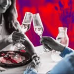 Couple enjoying a romantic dinner, symbolizing thoughtful Valentine's Day celebrations amidst changing spending habits.