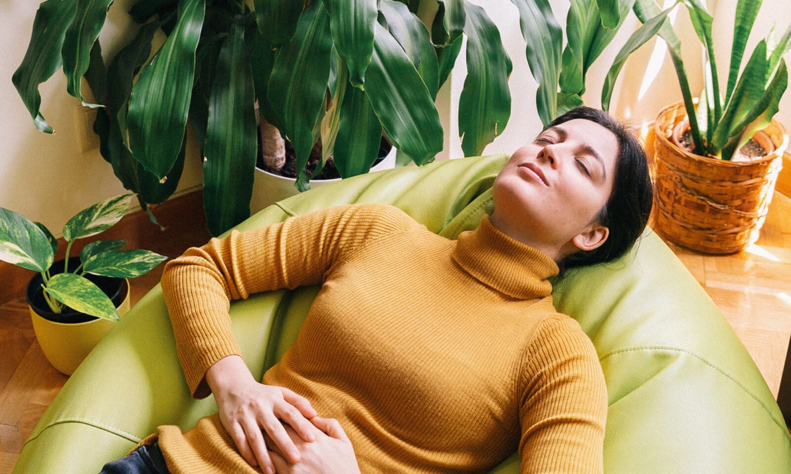 A young woman looking thoughtfully, representing proactive health choices for fertility.