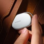 Xiaomi Tag: The Smart Tracker That Clips On, No Case Needed 6 The Xiaomi Tag, an elongated Bluetooth tracker, shown with its integrated metal loop for easy attachment.