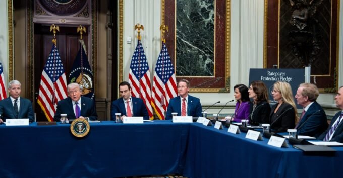 President Donald Trump with leaders of major tech companies signing a pledge at the White House, addressing data center energy demands.