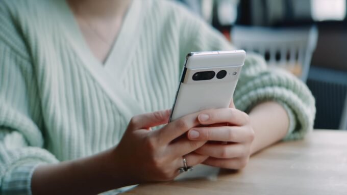 Personalize Your Calls: Android's New Customizable Calling Cards Arrive 10 Screenshot of Google Phone app showing customizable calling card with a user's photo and name.