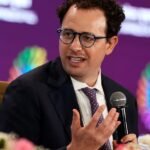 Anthropic CEO Dario Amodei addressing the media amidst controversy over AI ethics and government contracts.