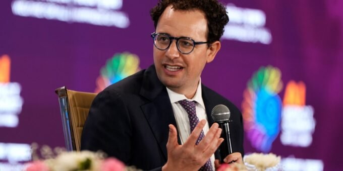 Anthropic CEO Dario Amodei addressing the media amidst controversy over AI ethics and government contracts.