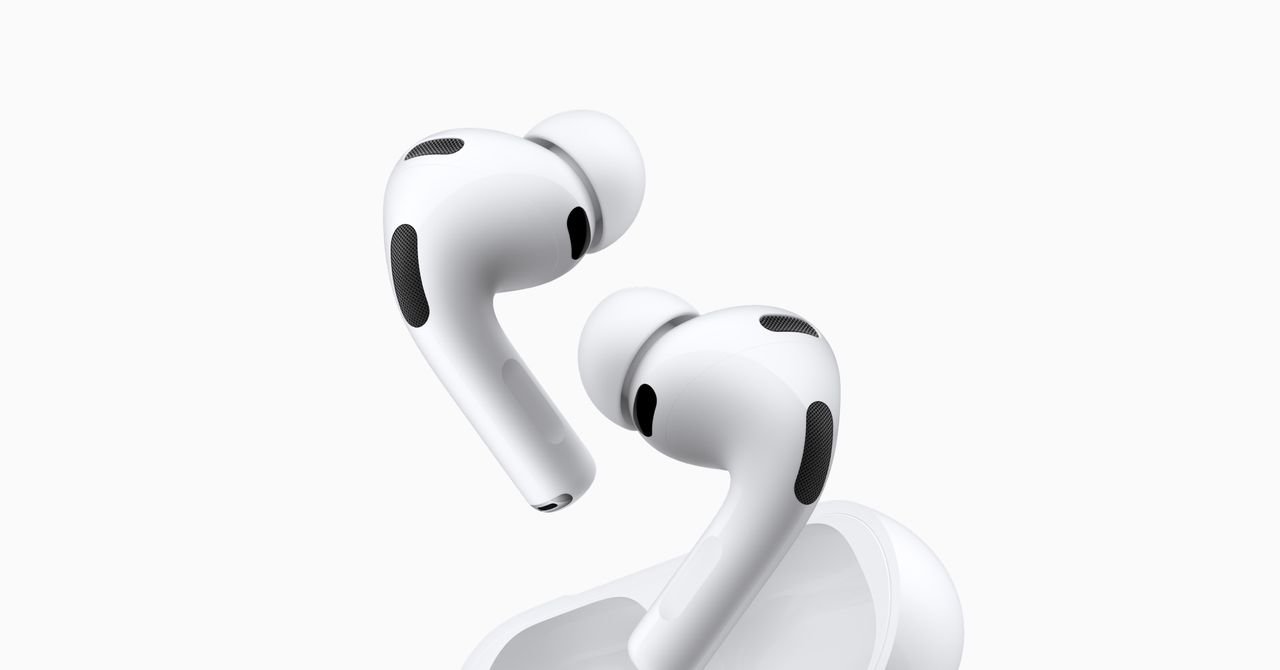 Person wearing AirPods, with a visual representation of real-time language translation appearing between two people speaking different languages.
