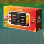 My Arcade Atari Gamestation Go handheld console displaying classic games like Pac-Man