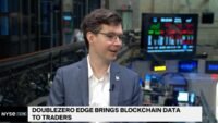 Austin Federa speaking about DoubleZero's 'Edge' platform, illustrating blockchain integration in trading.