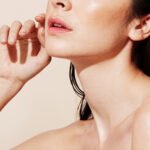 Close-up of a woman's neck, illustrating crepey skin texture, with a focus on skincare solutions.