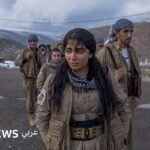 مقاتلون أكراد إيرانيون يشاركون في تدريب عسكري قرب أربيل، إقليم كردستان العراق.