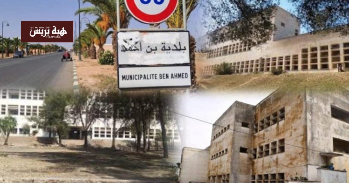 صورة لمستشفى ابن أحمد المهجور محاطاً بالأشجار، ترمز إلى الإهمال والحاجة لإعادة التأهيل.